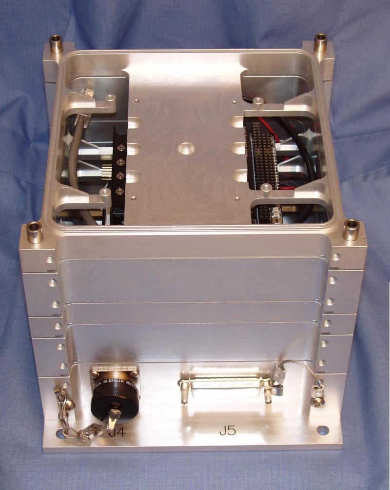 Electronics Stack with Integrated Heat Spreader